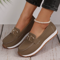 Women's buckle loafers with round toes, moccasin stitching and flat contrasting soles