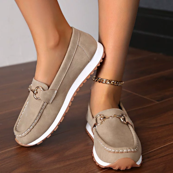 Women's flat loafers with moc toe, metal buckle trim and textured soles