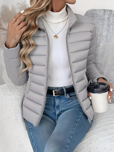 Women's quilted padded jacket with high collar and zip fastening
