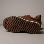 Low-top lace-up trainers with textured side panels and flat soles
