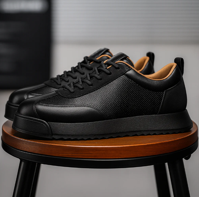 Low-top lace-up trainers with textured side panels and flat soles