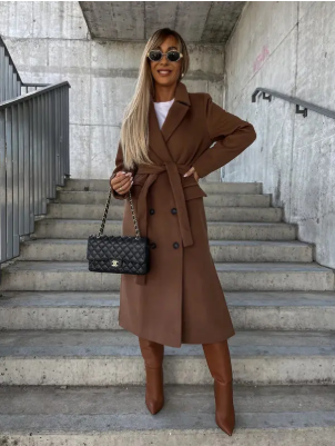 Women's long belted double-breasted coat with notched lapels and flap pockets
