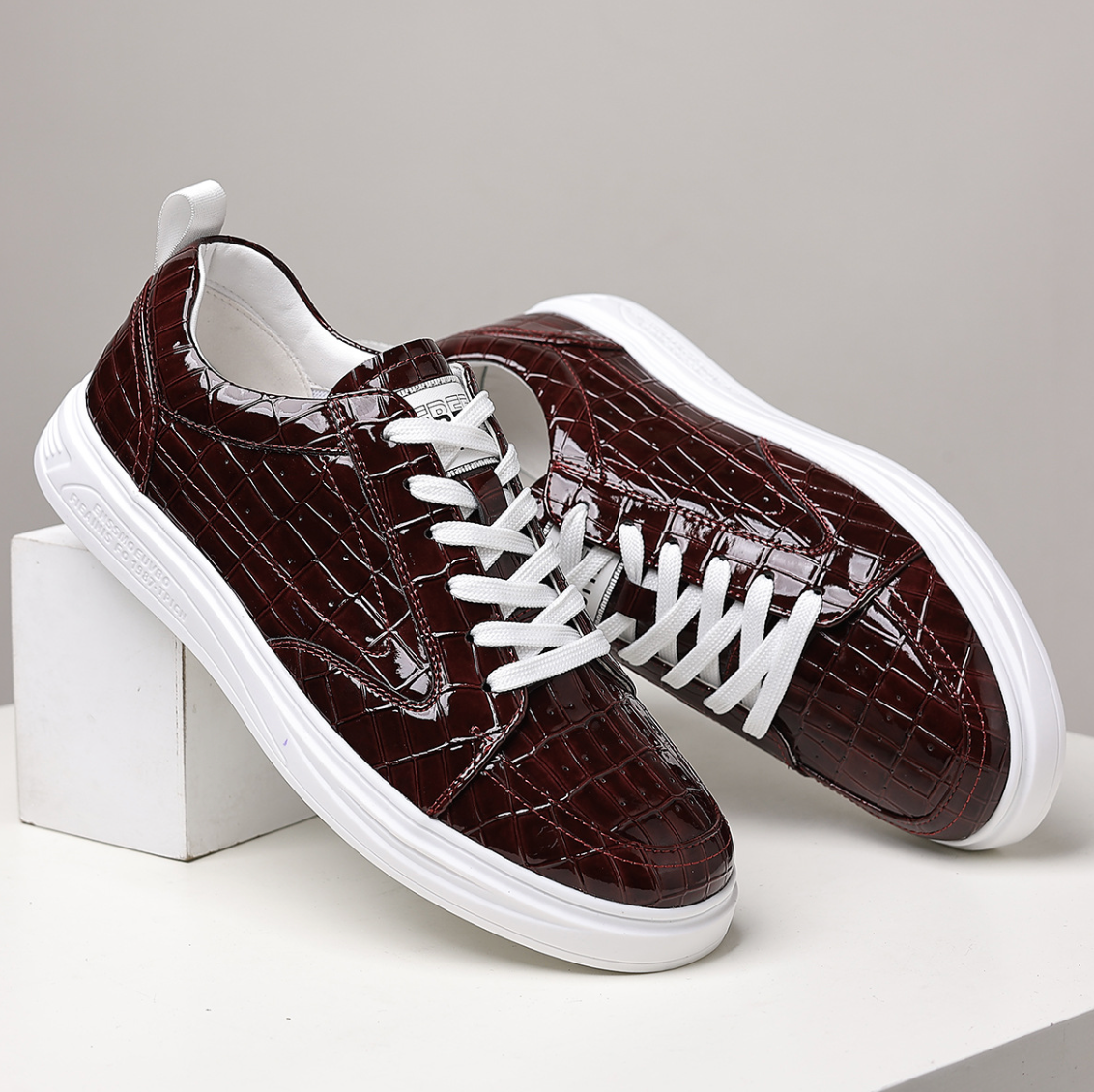 Croc-embossed lace-up trainers with white soles