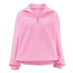 Women's pink fleece half-zip pullover with stand collar and long sleeves