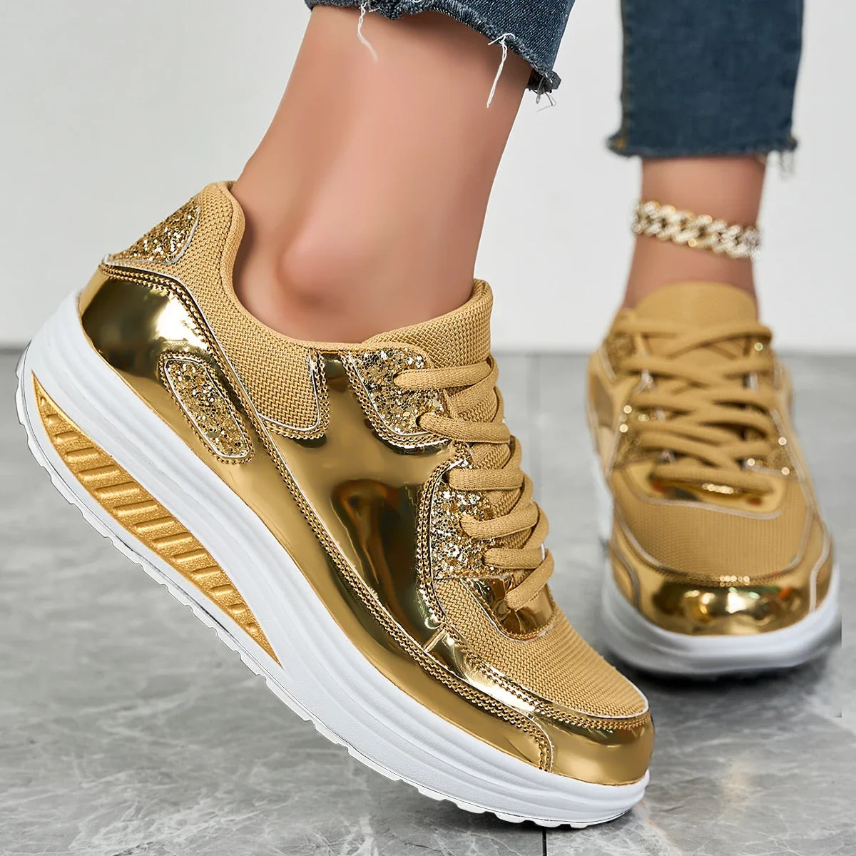 Women's embellished lace-up sneakers with metallic panels and layered platform soles