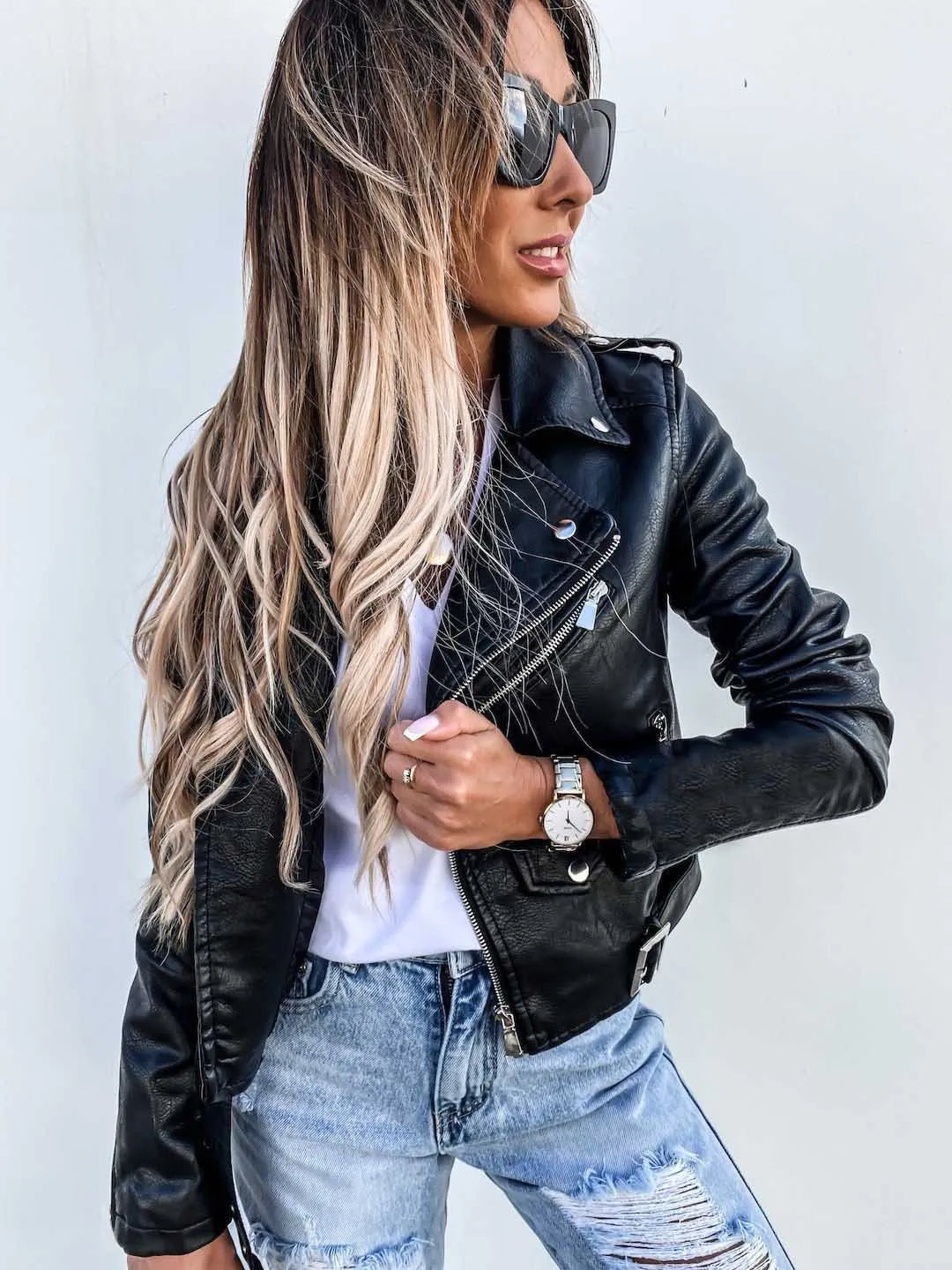Women's textured biker jacket with asymmetric zip, notched collar and buckled waist belt