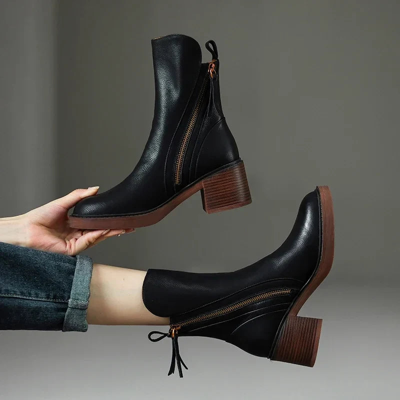Women's ankle boots with side zips, almond toes and ribbed block heels