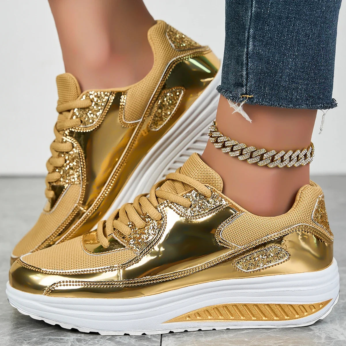 Women's embellished lace-up sneakers with metallic panels and layered platform soles