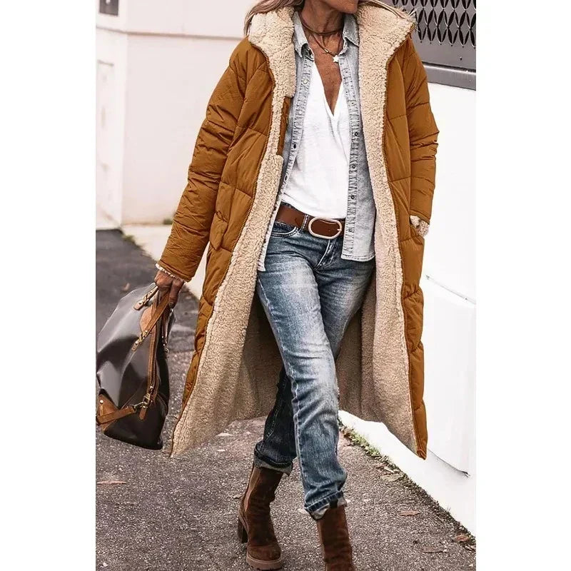 Women's long quilted hooded coat with contrasting textured trim and side pockets