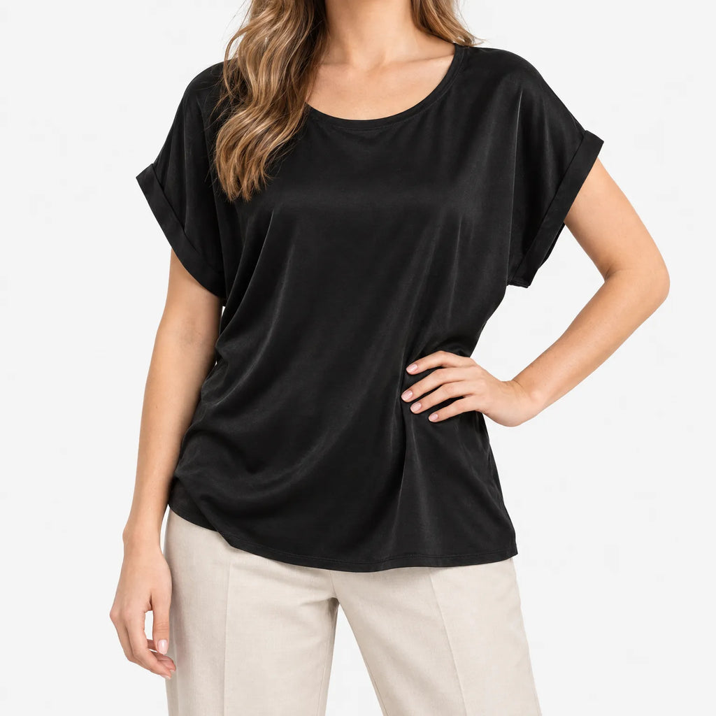 Women's plain relaxed short sleeve blouse with crew neckline and folded cuffs
