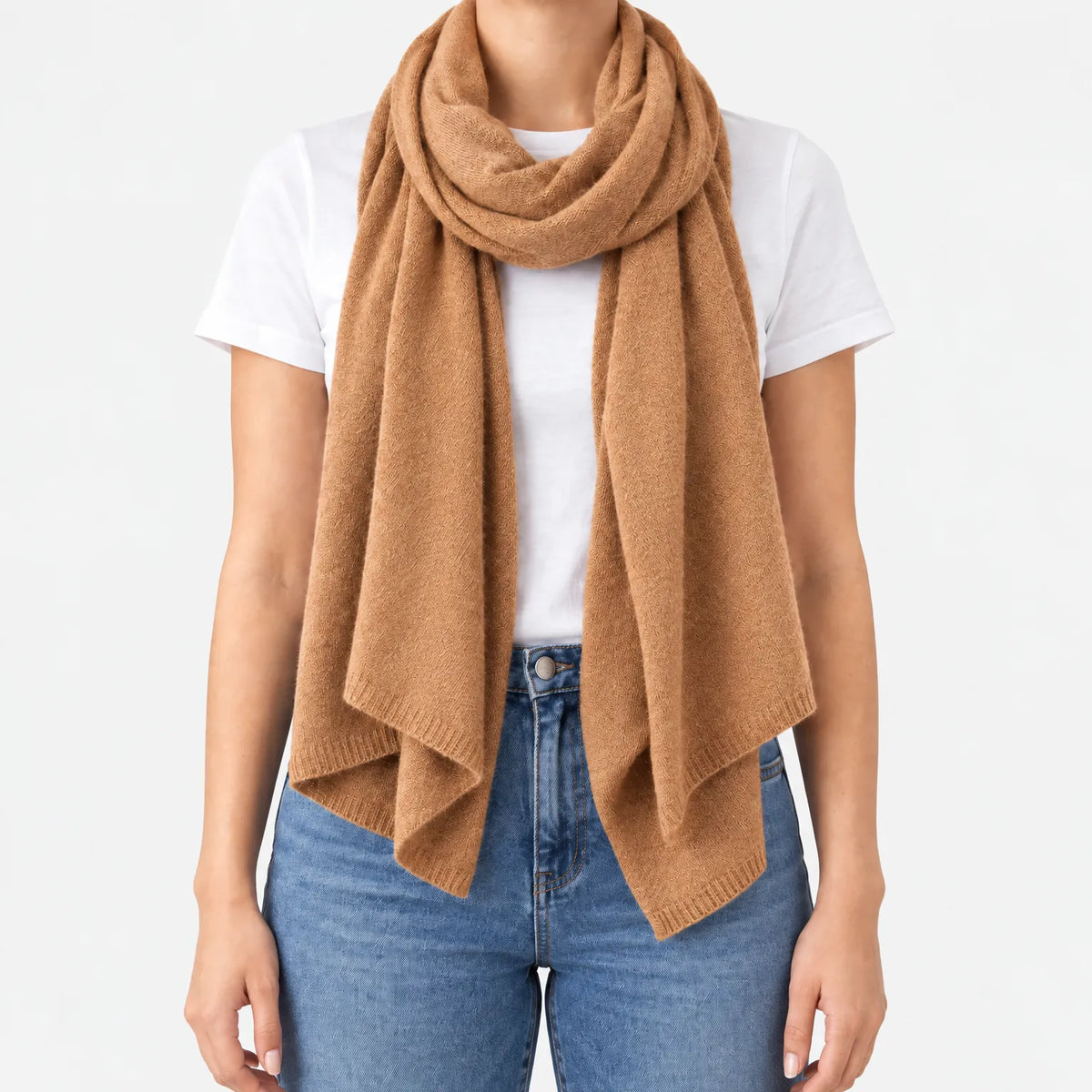 Women's long plain scarf with ribbed edges worn in a draped wrap