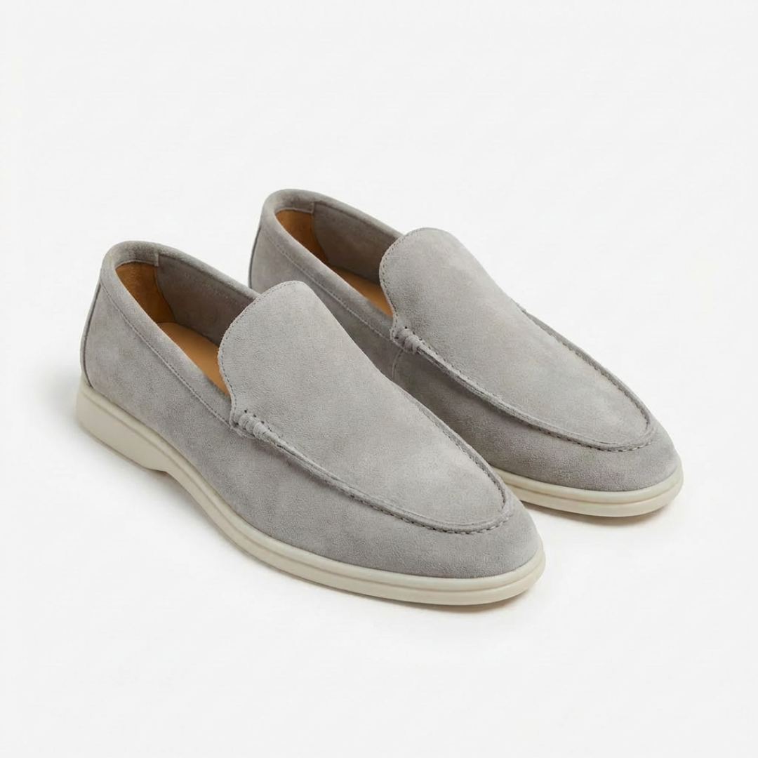 Men's slip-on loafers with stitched uppers and contrasting flat soles