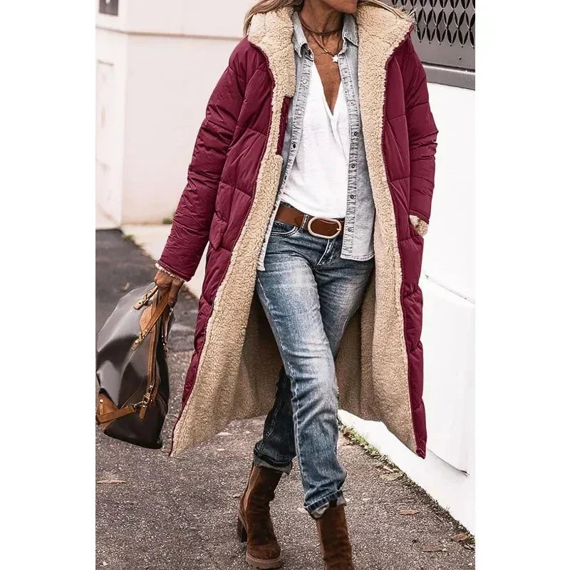 Women's long quilted hooded coat with contrasting textured trim and side pockets