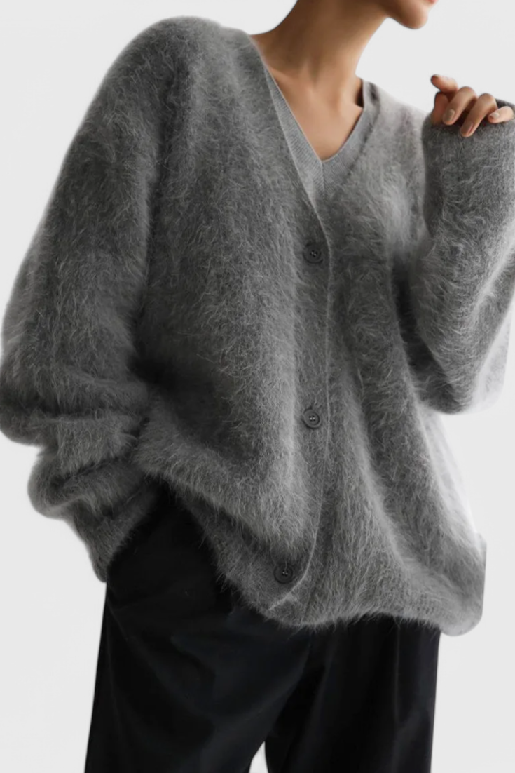 Women's relaxed V-neck button-front cardigan with long sleeves and ribbed trims