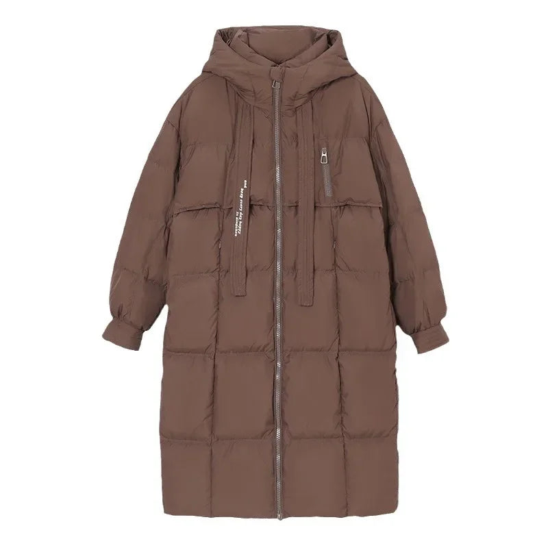 Women's long hooded quilted puffer coat with oversized fit and zip front