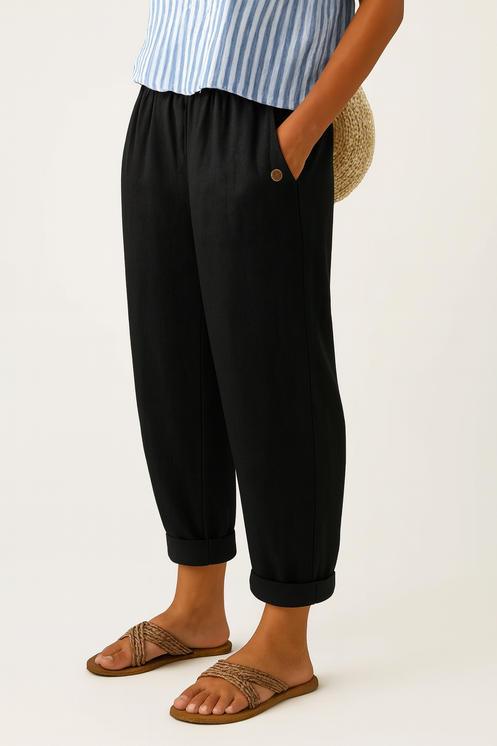Women's plain cropped trousers with elasticated waist, side pockets and turn-up cuffs