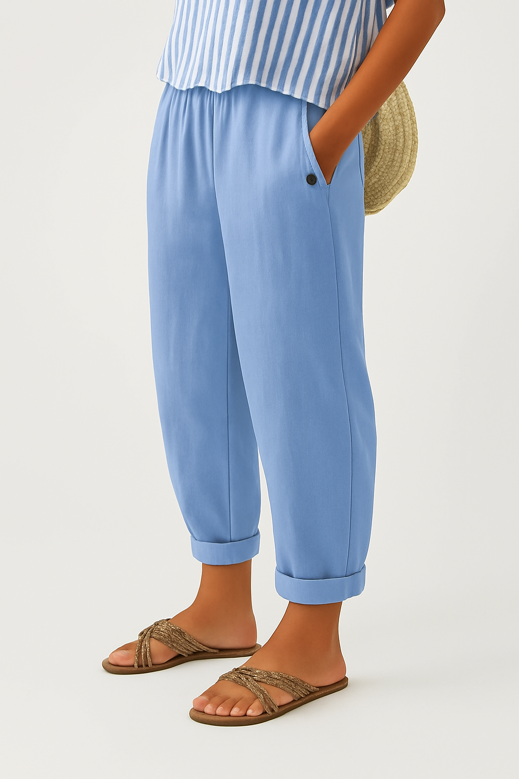 Women's plain cropped trousers with elasticated waist, side pockets and turn-up cuffs