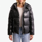 Women's glossy quilted hooded puffer jacket with long sleeves and front zip