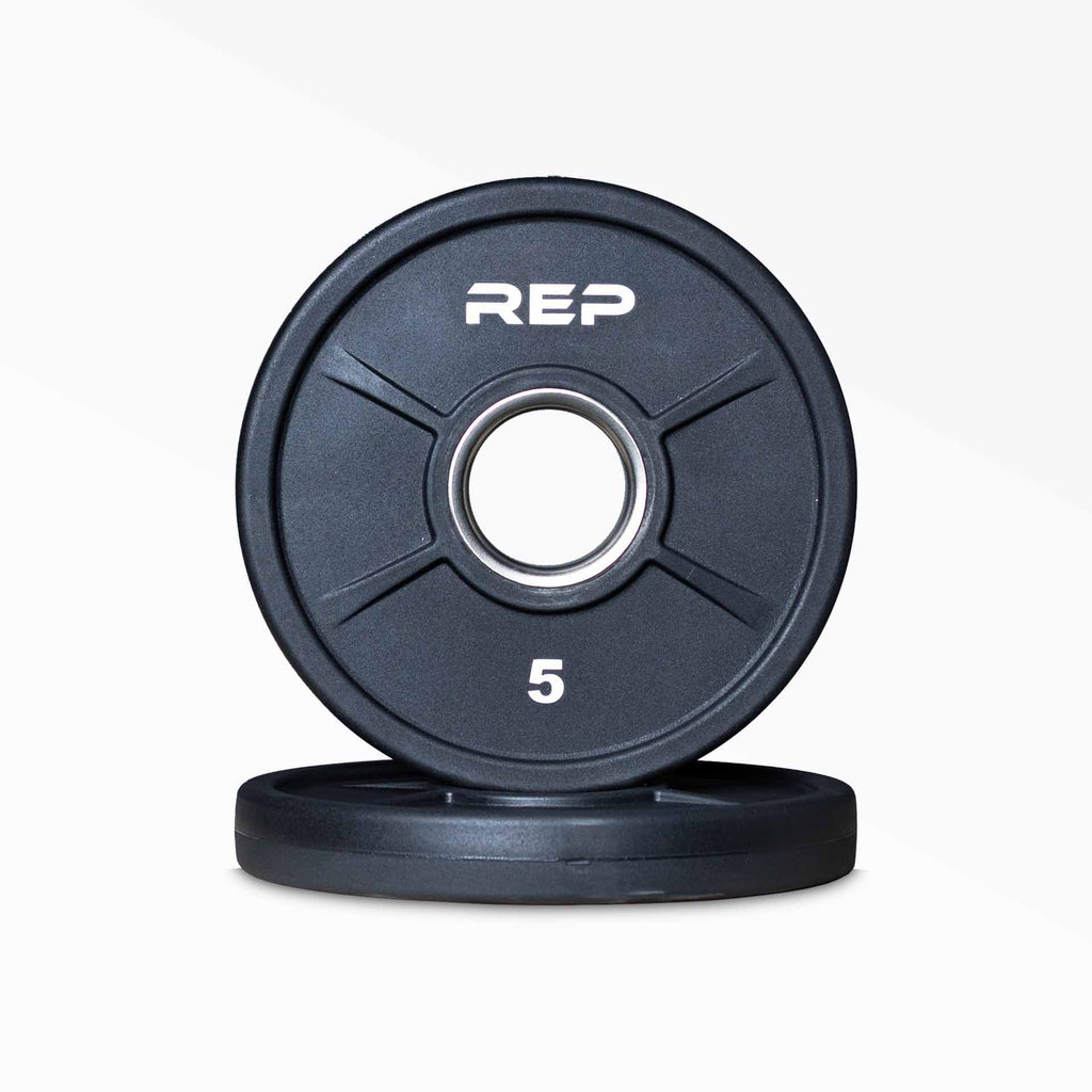Black circular Olympic weight plate with six grip holes and 45 marking
