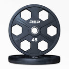 Black circular Olympic weight plate with six grip holes and 45 marking