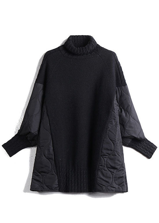 Women's longline turtleneck sweater with quilted patchwork sleeves and side panels