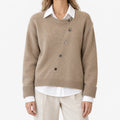 Women's asymmetric button front knitted cardigan with long sleeves and ribbed trims