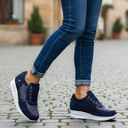 Women's low-top trainers with lace-up fronts, side zips, textured panels and flat ridged soles