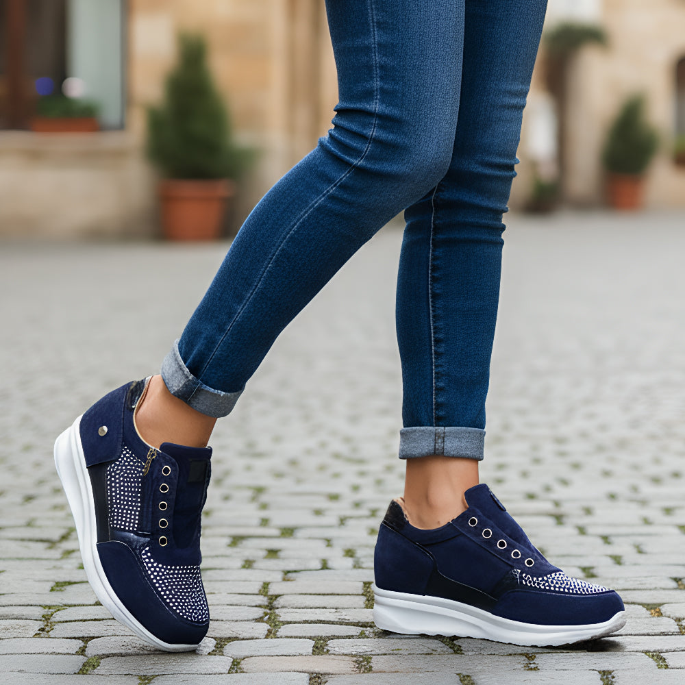 Women's low-top trainers with lace-up fronts, side zips, textured panels and flat ridged soles
