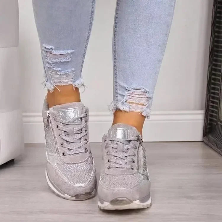Women's low-top trainers with lace-up fronts, side zips, textured panels and flat ridged soles