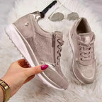 Women's low-top trainers with lace-up fronts, side zips, textured panels and flat ridged soles