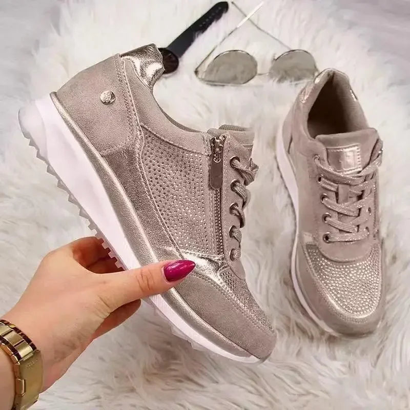 Women's low-top trainers with lace-up fronts, side zips, textured panels and flat ridged soles