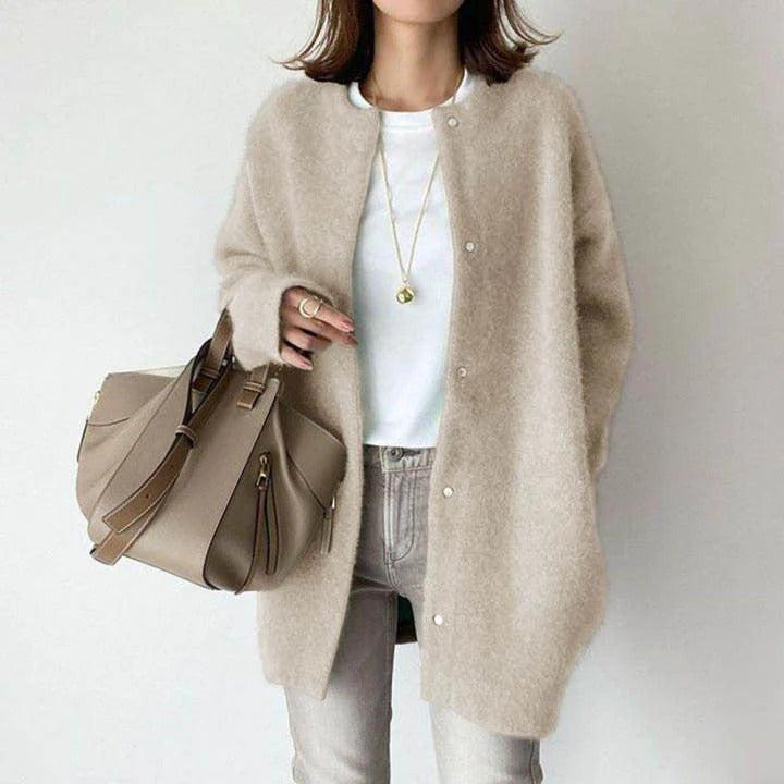 Women's relaxed fit long coat with round neck, long sleeves and snap buttons