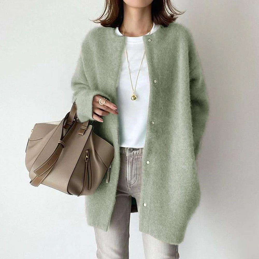 Women's relaxed fit long coat with round neck, long sleeves and snap buttons