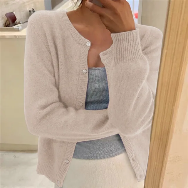 Women's plain knitted cardigan with round neck, long sleeves and button front