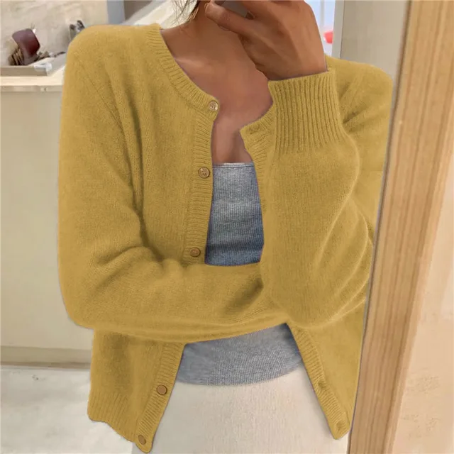 Women's plain knitted cardigan with round neck, long sleeves and button front