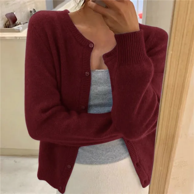 Women's plain knitted cardigan with round neck, long sleeves and button front