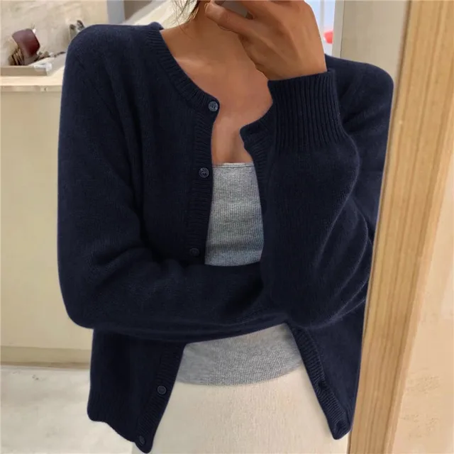 Women's plain knitted cardigan with round neck, long sleeves and button front