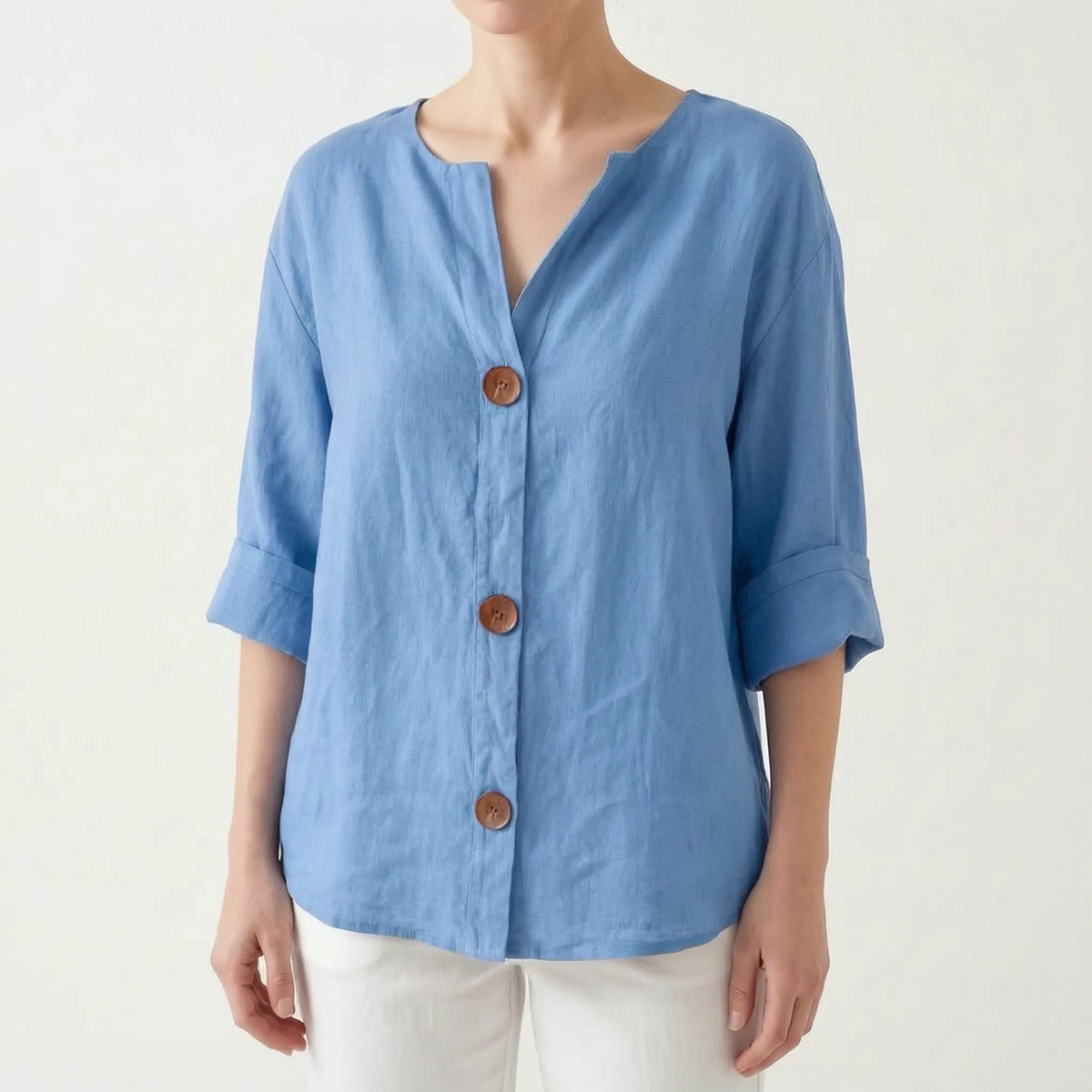 Women's orange V-neck button-down blouse with rolled three-quarter sleeves
