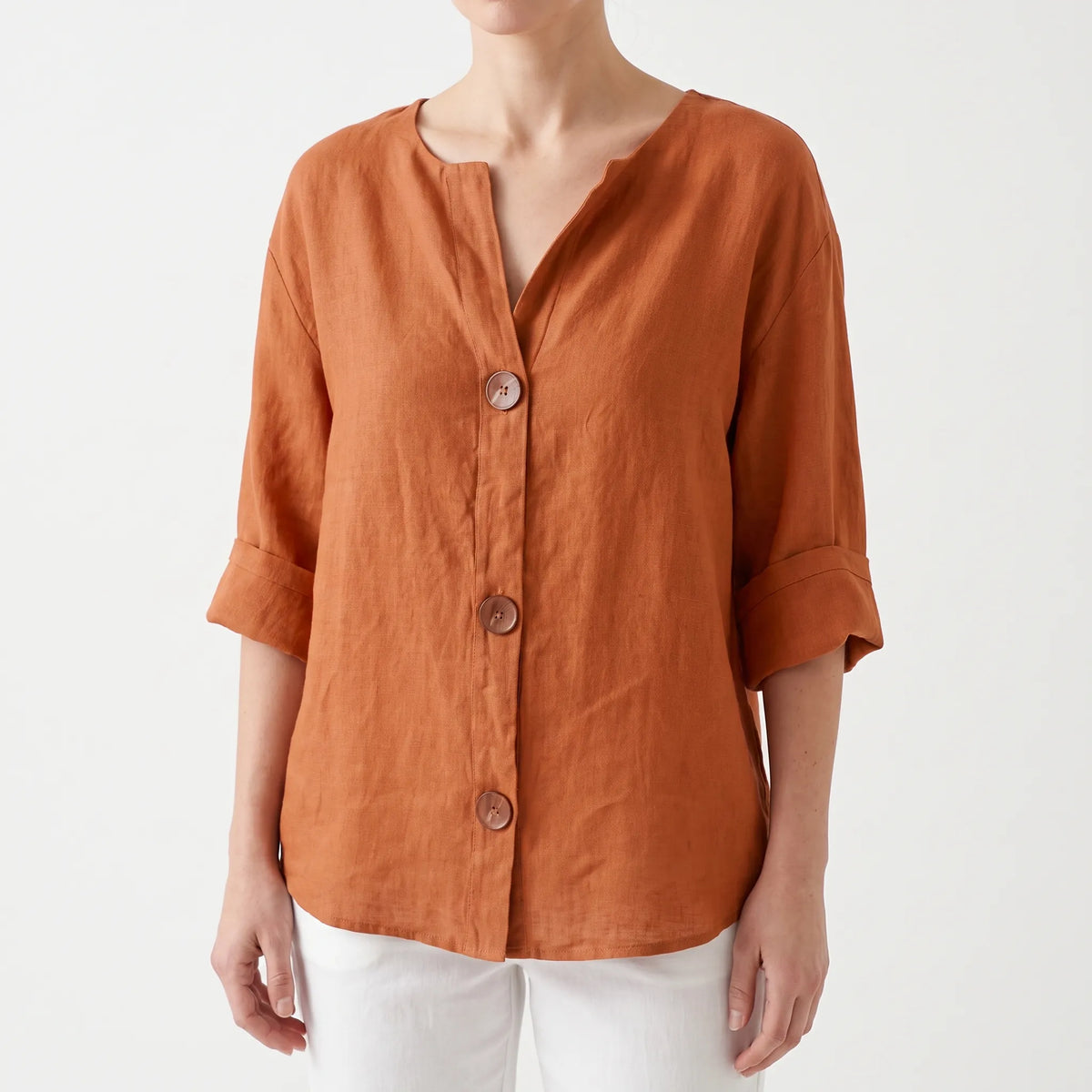 Women's orange V-neck button-down blouse with rolled three-quarter sleeves
