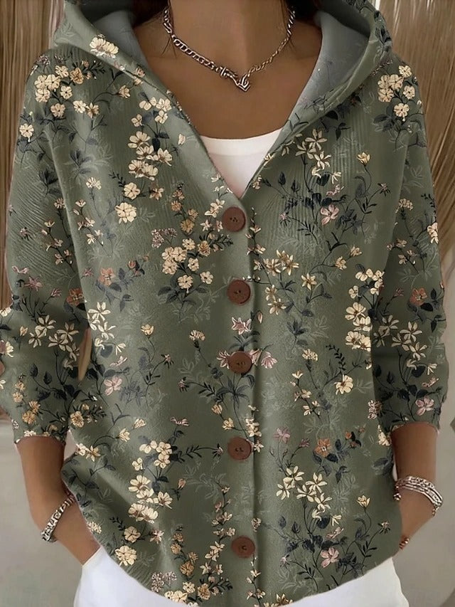 Women's hooded button cardigan shown in multicoloured patchwork and bee motif designs