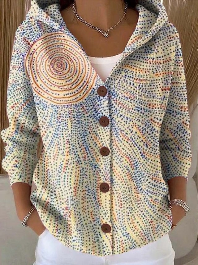 Women's hooded button cardigan shown in multicoloured patchwork and bee motif designs
