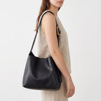 Women's rounded slouchy hobo bag with adjustable shoulder strap