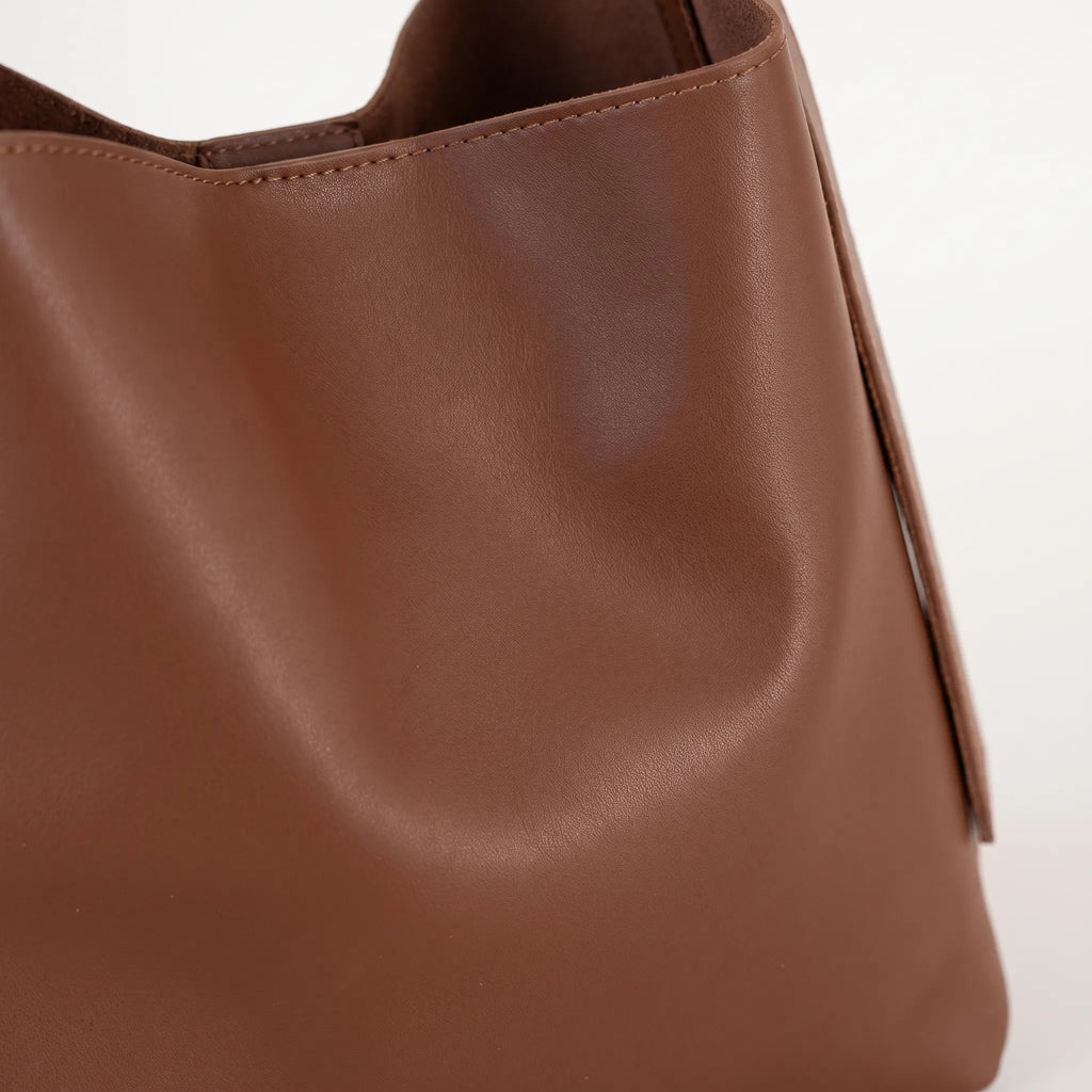 Women's rounded slouchy hobo bag with adjustable shoulder strap