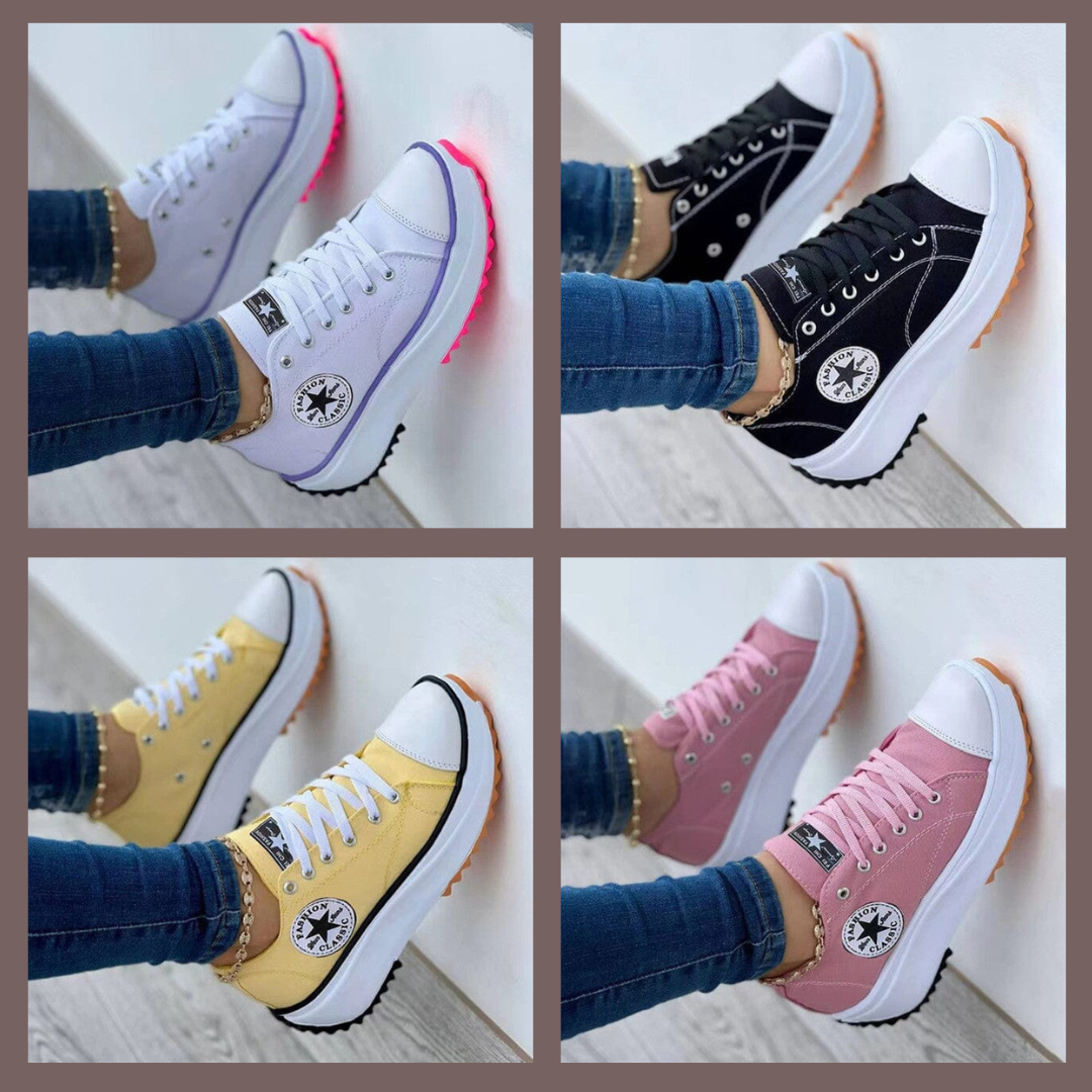 Women's low-top lace-up trainers with panelled uppers, side patches and flat ridged soles
