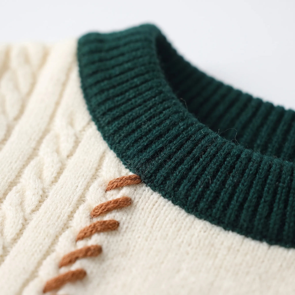 Men's patchwork cable knit jumper with contrasting panels and stitched details