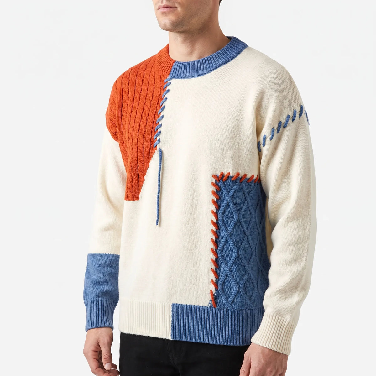 Men's patchwork cable knit jumper with contrasting panels and stitched details