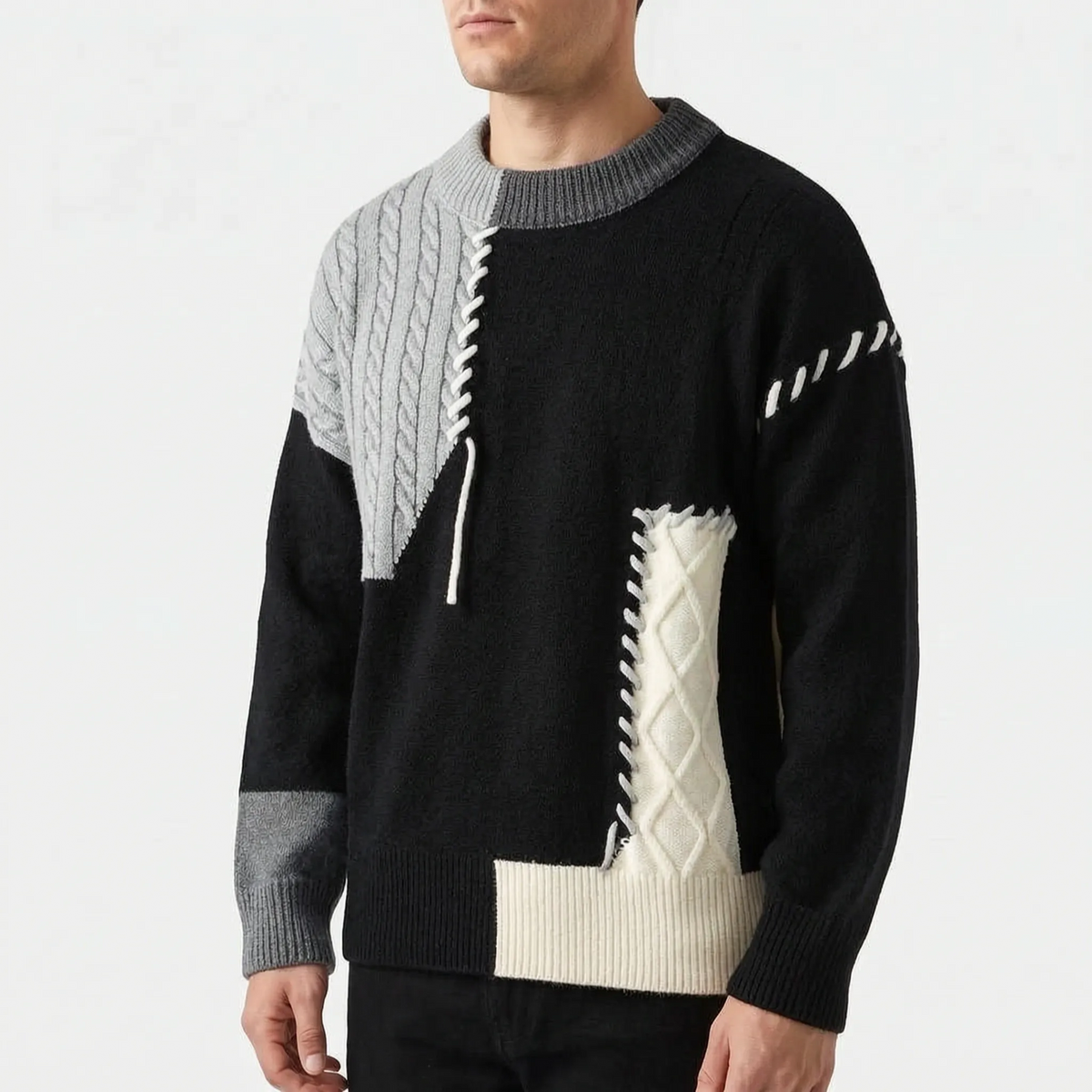 Men's patchwork cable knit jumper with contrasting panels and stitched details
