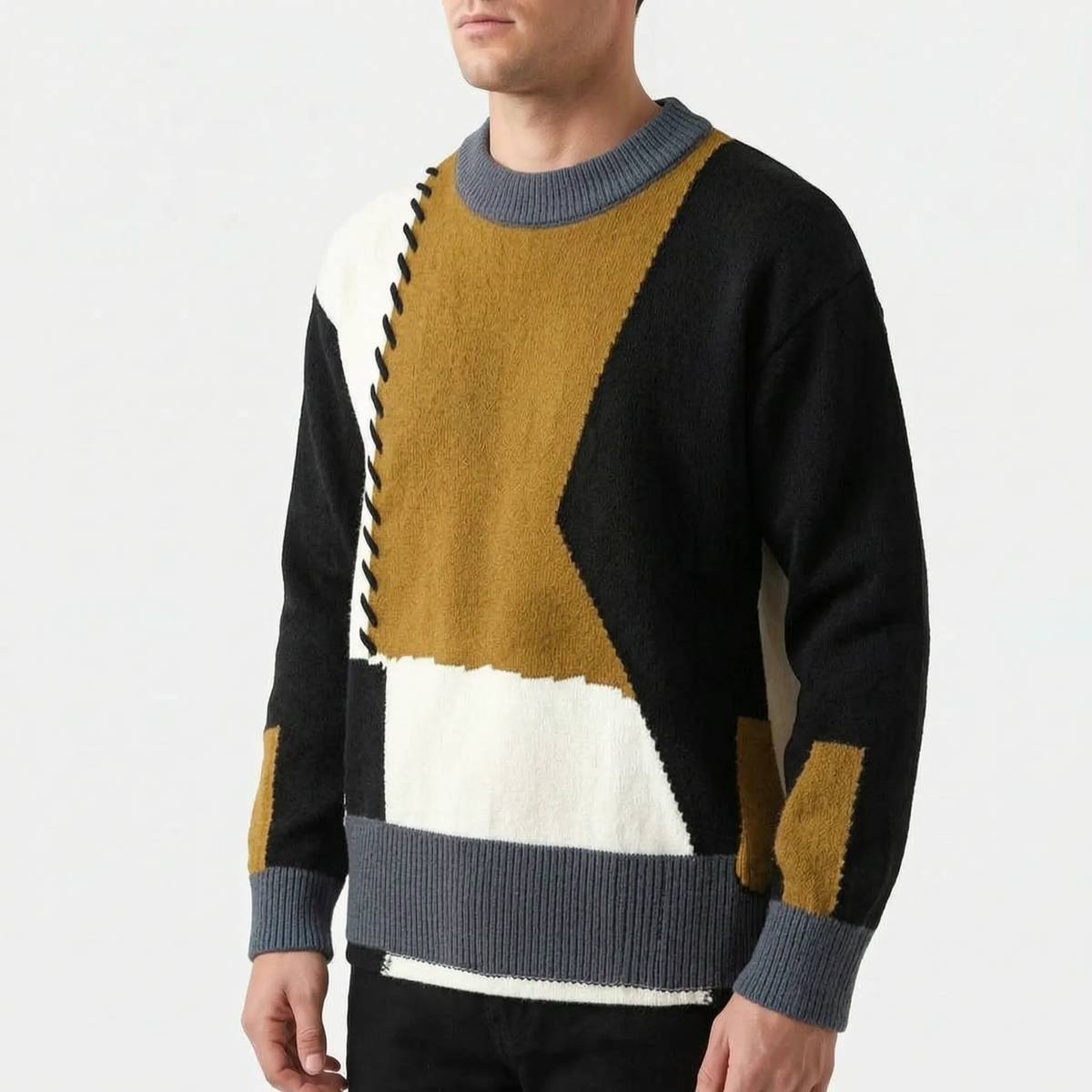 Men's patchwork cable knit jumper with contrasting panels and stitched details