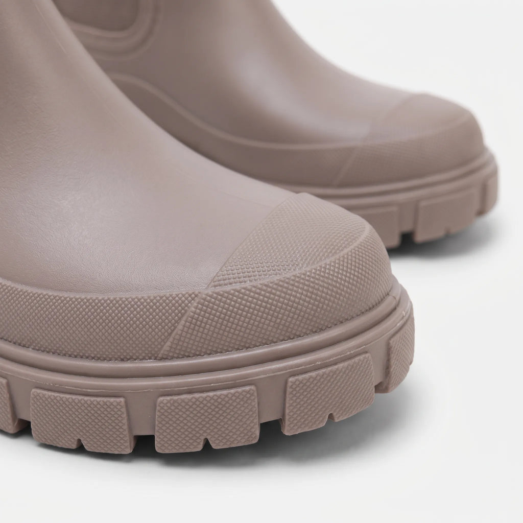 Women's Chelsea rain boots with elastic side panels and chunky lug soles