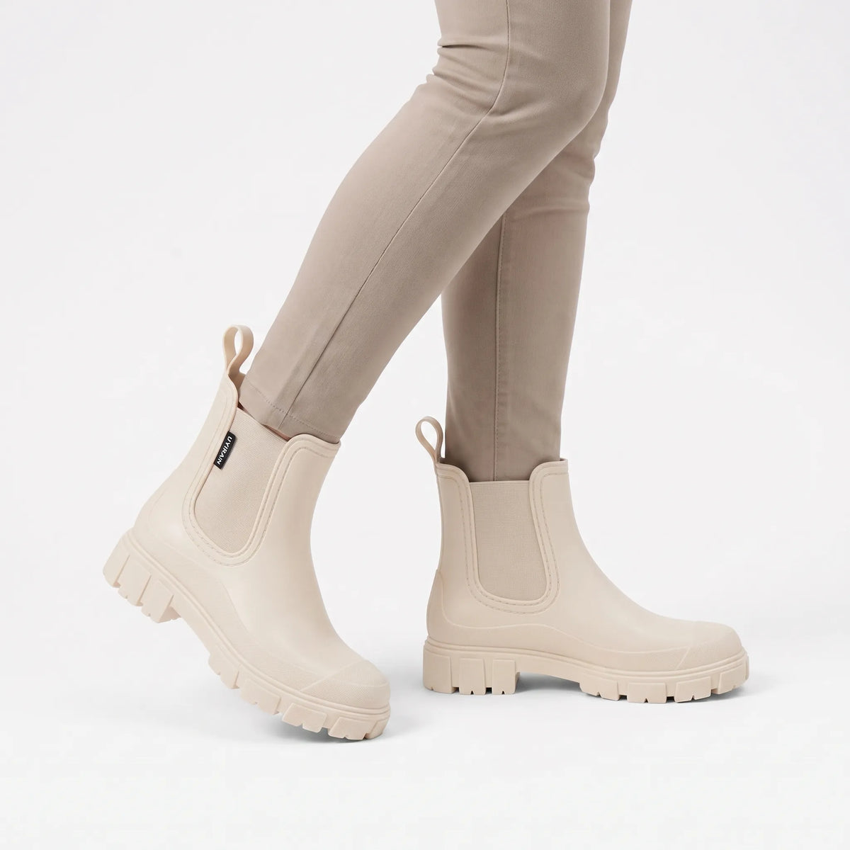 Women's Chelsea rain boots with elastic side panels and chunky lug soles